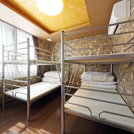Guesthouse Tiga Kumamoto Szoba fotó
