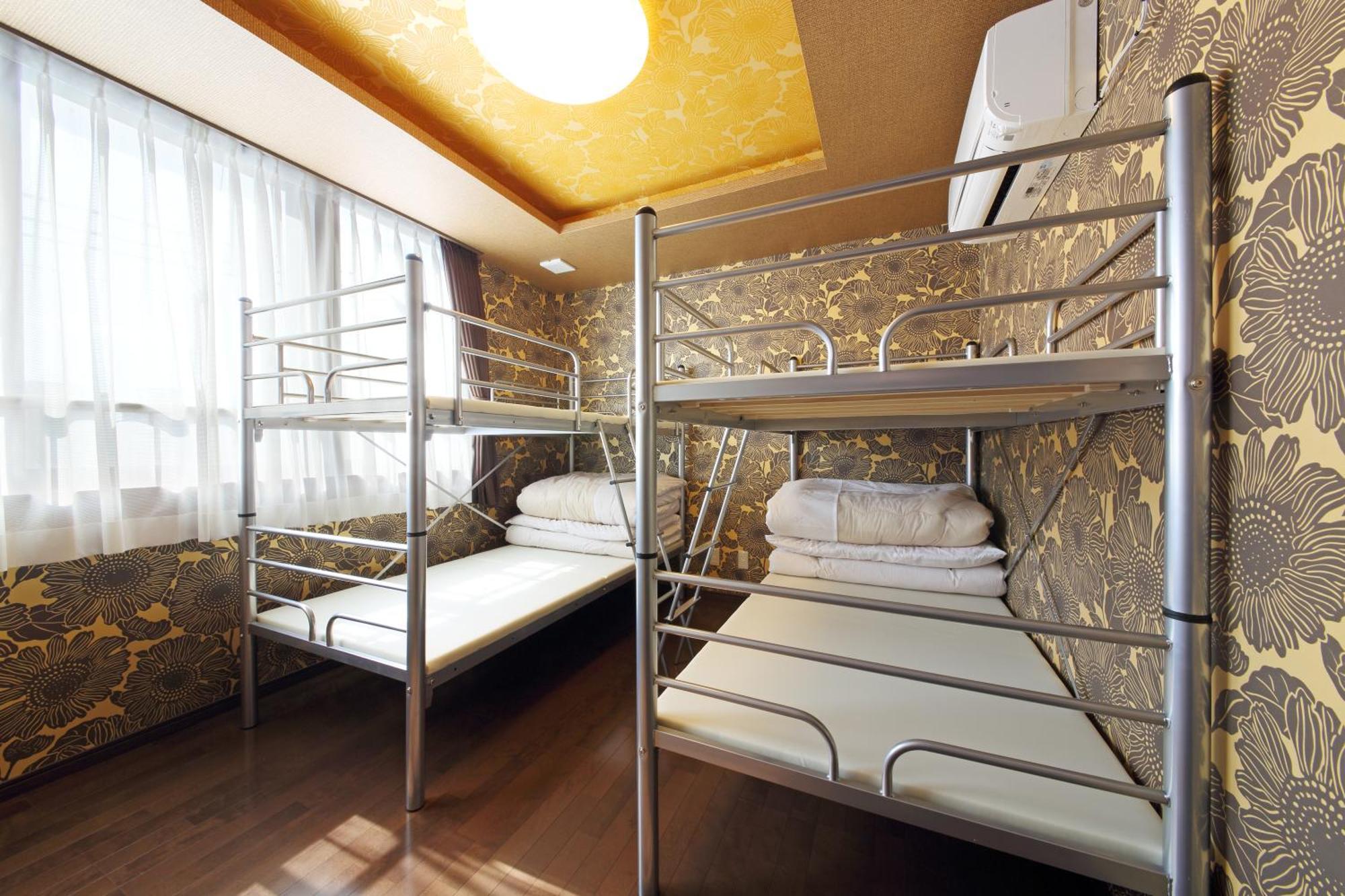 Guesthouse Tiga Kumamoto Szoba fotó