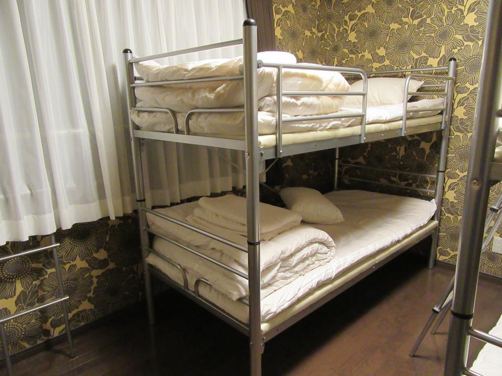 Guesthouse Tiga Kumamoto Szoba fotó