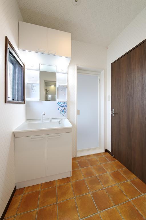 Guesthouse Tiga Kumamoto Szoba fotó