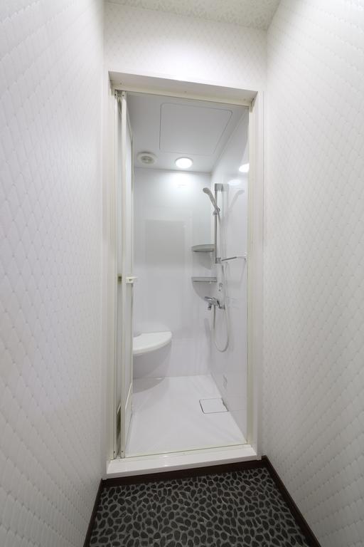Guesthouse Tiga Kumamoto Szoba fotó